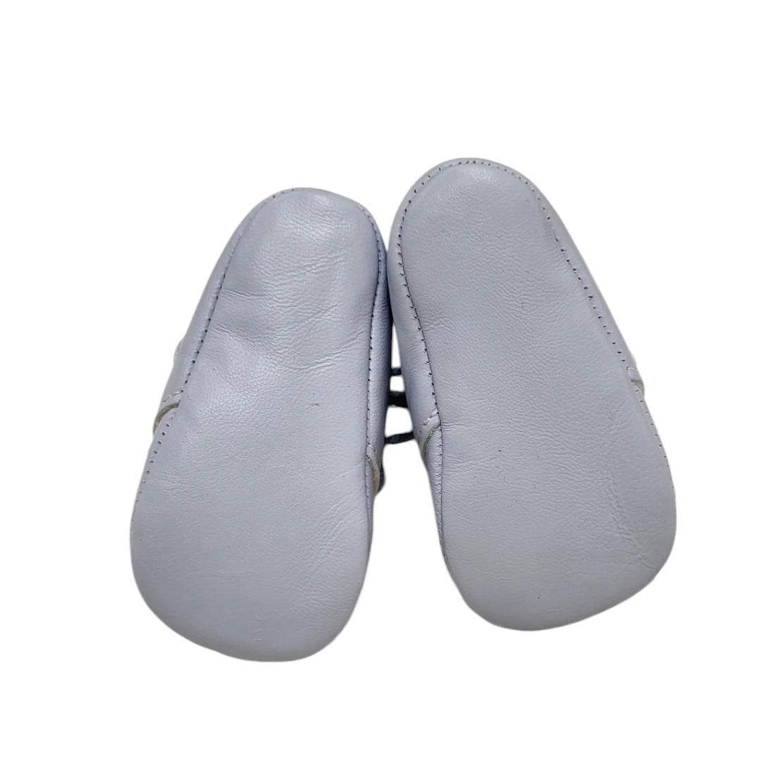 Botita de piel con cordones