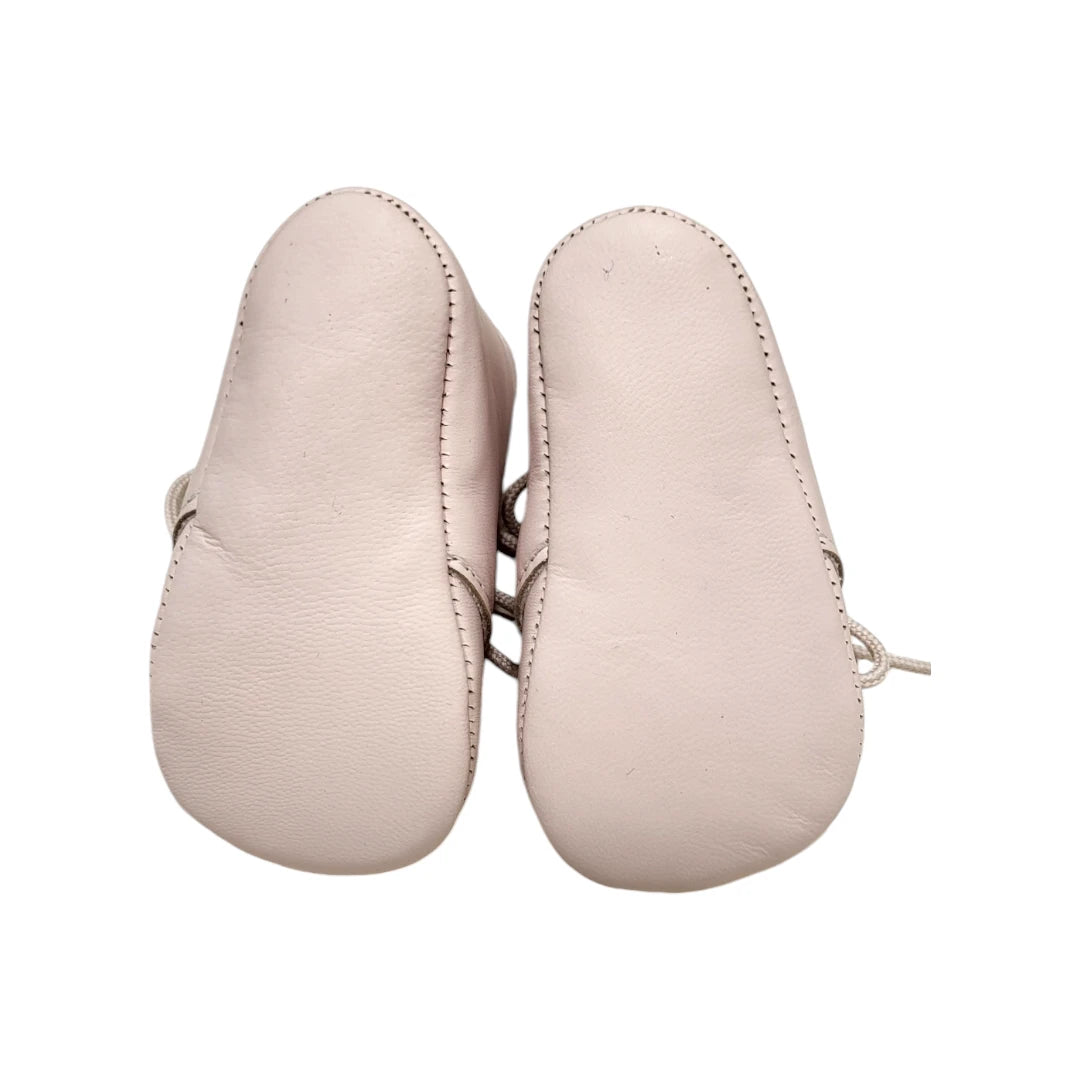 Botita de piel con cordones